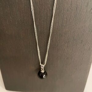 Elegant Silver Tone Necklace with Black Pendant